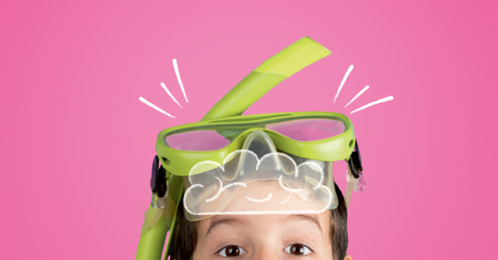 Máscara de mergulho verde com snorkel contra fundo rosa vibrante.